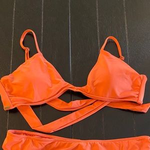 Burnt orange Rip Curl Swimsuit. Size medium